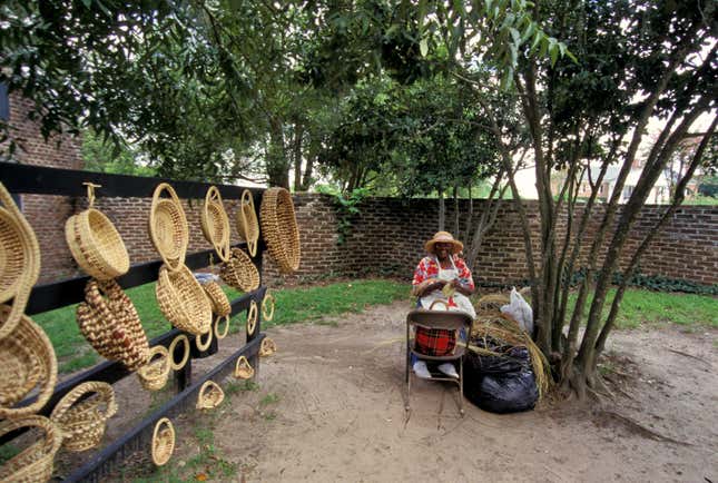 South Carolina, Charleston, Boone Hall Plantation, Basket Weaver. (Photo by Education Images/Universal Images Group via Getty Images