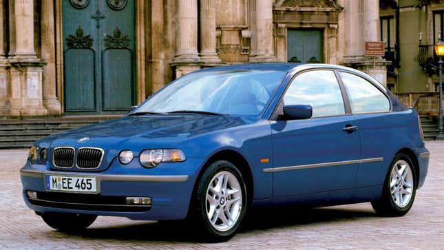 A photo of a blue E36 BMW car. 