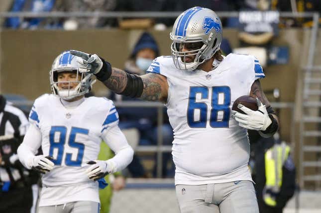 Jan 2, 2022; Seattle, Washington, USA; Detroit Lions offensive tackle Taylor Decker (68) celebrates after catching a touchdown pass against the Seattle Seahawks during the third quarter at Lumen Field.