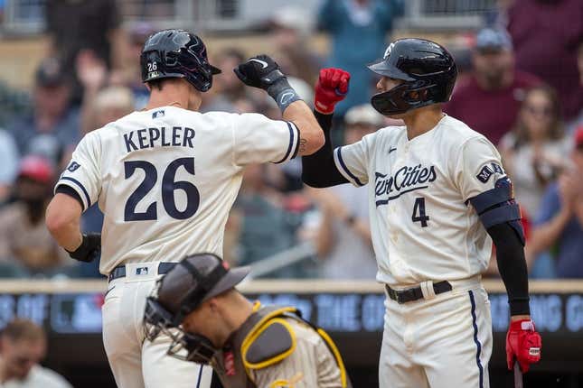 May 10, 2023; Minneapolis, Minnesota, USA; Minnesota Twins right fielder Max Kepler (26) celebrates with shortstop Carlos Correa (4) after hitting a solo home run in the first inning against the San Diego Padres at Target Field.