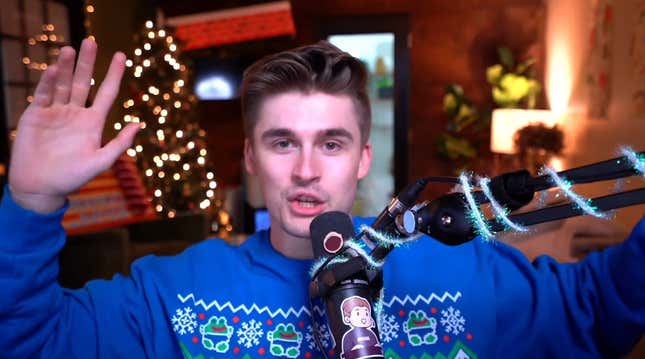 Ludwig Ahgren appears in a Christmas sweater after being banned from YouTube. 