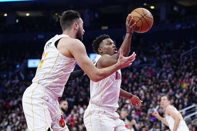 Mar 28, 2023; Toronto, Ontario, CAN; Miami Heat guard Kyle Lowry (7) and guard Max Strus (31) battle for a rebound against the Toronto Raptors during the second half at Scotiabank Arena.