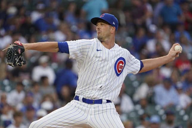 Aug 2, 2023; Chicago, Illinois, USA; Chicago Cubs starting pitcher Drew Smyly (11) throws the ball against the Cincinnati Reds during the first inning at Wrigley Field.