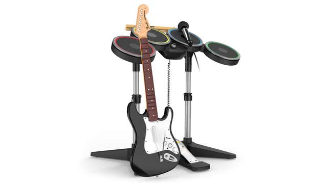 Promotional image for Rock Band 4 shows a guitar and drum controller for the game.