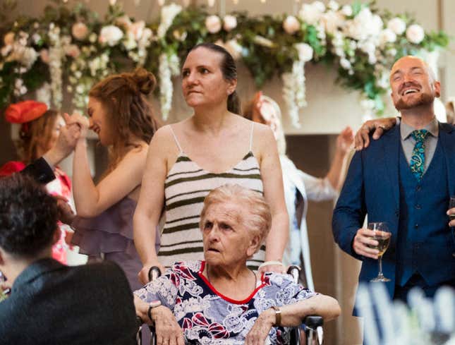 Image for article titled Grandma Wheeled Onto Wedding Dance Floor Given Halfhearted Spin