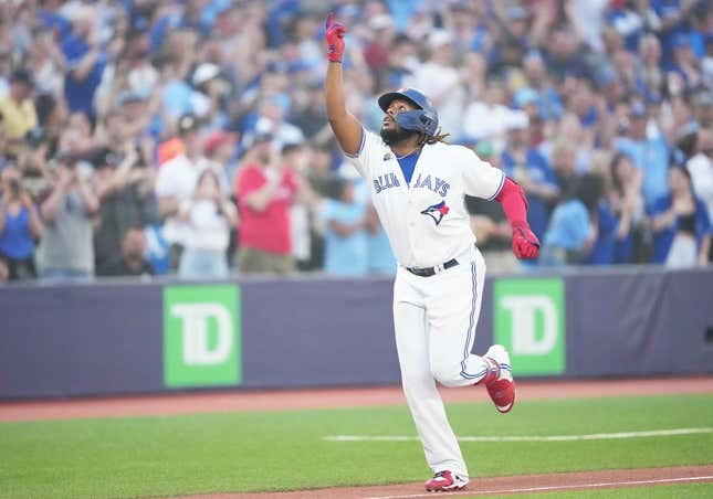 June 29, 2023;  Toronto, Ontario, CAN;  Designated hitter Vladimir Guerrero Jr. (27) of the Toronto Blue Jays celebrates after hitting a two-run home run during the sixth inning against the San Francisco Giants at Rogers Centre.
