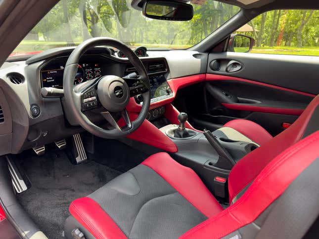 Interior view from driver's side door image of red 2023 Nissan Z