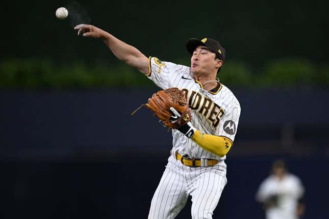 May 1, 2023; San Diego, California, USA; San Diego Padres second baseman Ha-Seong Kim (7) throws to first base during the sixth inning against the Cincinnati Reds at Petco Park.