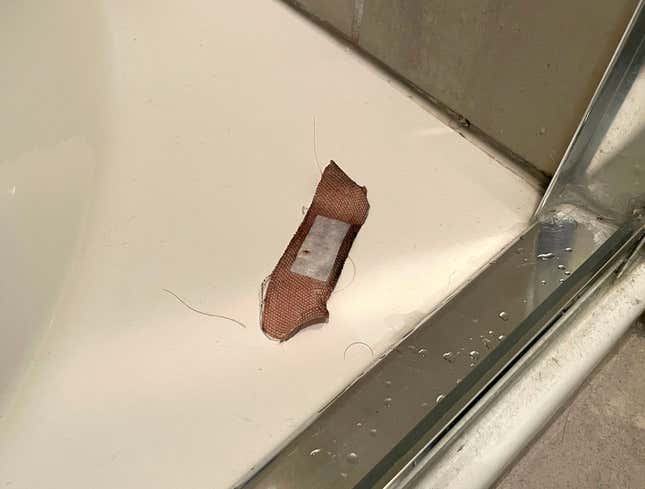 Image for article titled Man In Shower Sets Wet Band-Aid On Tub Edge To Throw Out In Few Months