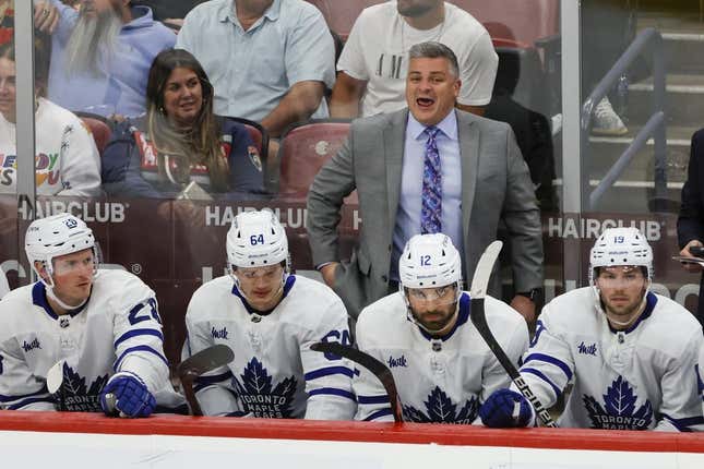 Mar 23, 2023; Sunrise, Florida, USA; Toronto Maple Leafs Sheldon Keefe reacts from the bench during the third period against the Florida Panthers at FLA Live Arena.