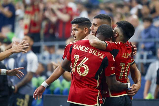Aug 20, 2023; Seattle, Washington, USA; Atlanta United forward Giorgos Giakoumakis (7, second from left) celebrates with defender Luis Abram (4, left), forward Xande Silva (16) and midfielder Luiz Araujo (10) after scoring a goal against the Seattle Sounders FC during the first half at Lumen Field.