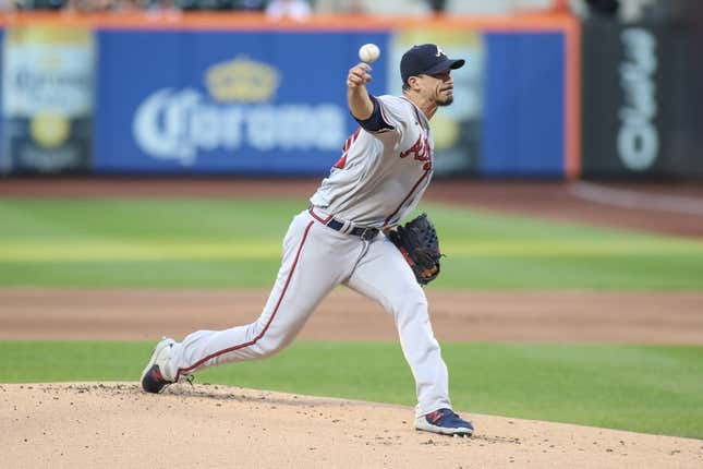 Aug 11, 2023; New York City, New York, USA;  Atlanta Braves starting pitcher Charlie Morton (50) pitches in the first inning against the New York Mets at Citi Field.