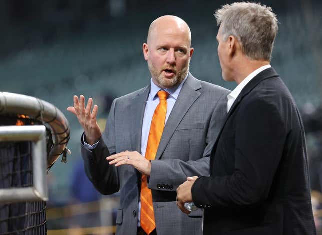 Oct 19, 2022; Houston, Texas, USA; Houston Astros general manger James Click (left) talks with former player Craig Biggio before game one of the ALCS for the 2022 MLB Playoffs against the New York Yankees at Minute Maid Park.
