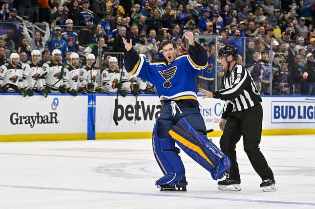 Mar 15, 2023; St. Louis, Missouri, USA; St. Louis Blues goaltender Jordan Binnington (50) hypes up the crowd after he was ejected from the game during the second period against the Minnesota Wild at Enterprise Center.