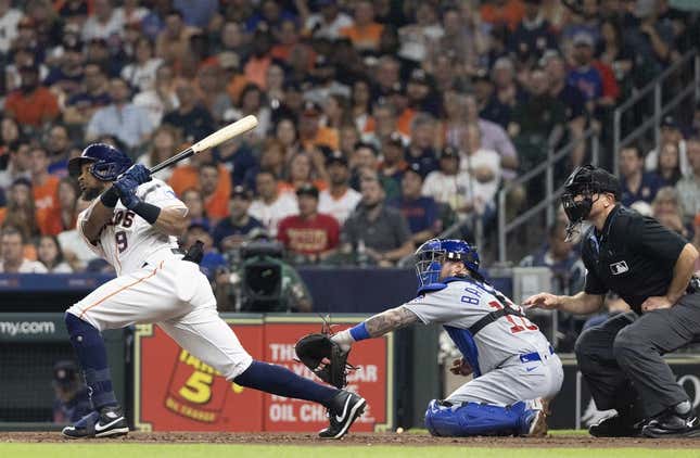 May 16, 2023; Houston, Texas, USA; Houston Astros left fielder Corey Julks (9) hits a double against there Chicago Cubs in the fourth inning at Minute Maid Park.