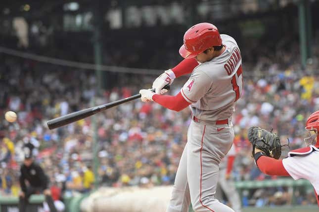 Apr 17, 2023; Boston, Massachusetts, USA;  Los Angeles Angels designated hitter Shohei Ohtani (17) hits a single during the first inning against the Boston Red Sox at Fenway Park.