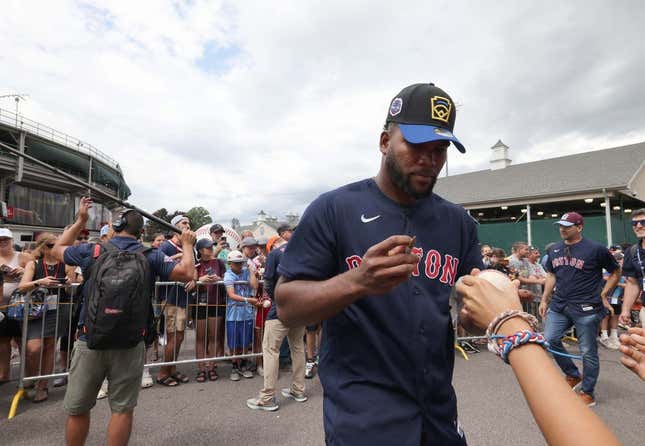 Boston Red Sox player Franchy Cordero signs autographs at the Little League World Series in South Williamsport, Pennsylvania, on Sunday, Aug. 21, 2022. The Red Sox and Baltimore Orioles played in the Little League Classic at Bowman Field on Sunday night.

CP 4