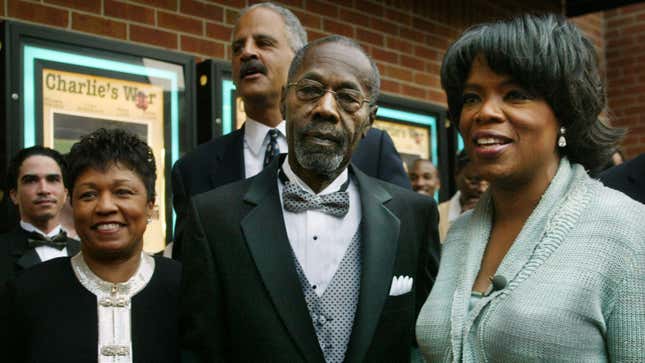 Vernon Winfrey, standing on Oprah’s right, and his daughter Oprah arrive at the opening of Charlie’s War at the Nashville Film Festival on May 2, 2003 in Nashville Tennesse.