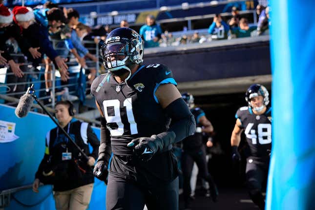 Jacksonville Jaguars defensive end Dawuane Smoot (91) takes to the field before a regular season NFL football matchup between the Jacksonville Jaguars and the Dallas Cowboys Sunday, Dec. 18, 2022 at TIAA Bank Field in Jacksonville. The Jacksonville Jaguars edged the Dallas Cowboys 40-34 in overtime. [Corey Perrine/Florida Times-Union]  Jki 121822 Cowboys Jags Cp 101