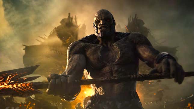 Darkseid gripping a weapon as a spaceship looms in the background behind him in Zack Snyder’s Justice League.
