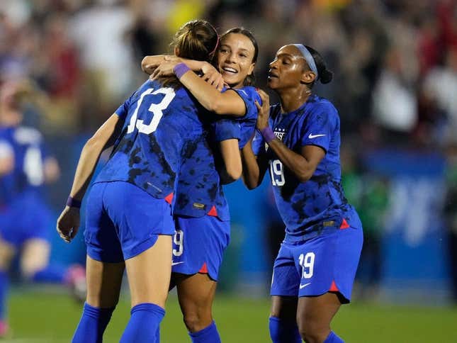 Feb 22, 2023; Frisco, Texas, USA; United States of America forward Alex Morgan (13) celebrates with forward Mallory Swanson (9) after scoring a goal against Brazil during the first half at Toyota Stadium.