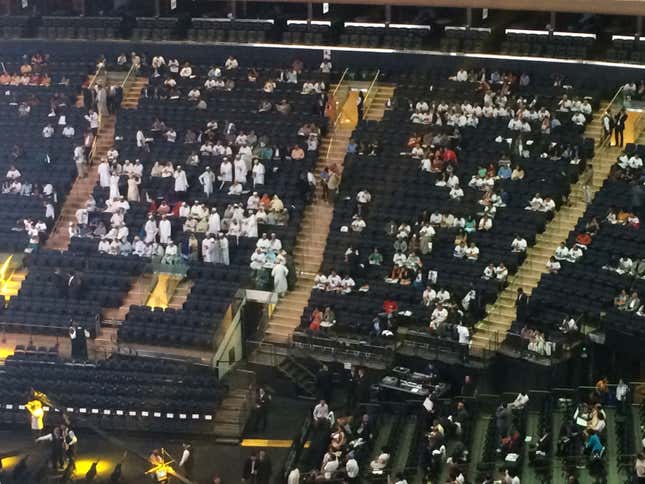 A group of attendees wearing a traditional Muslim outfit arrives at Madison Square Garden in New York.