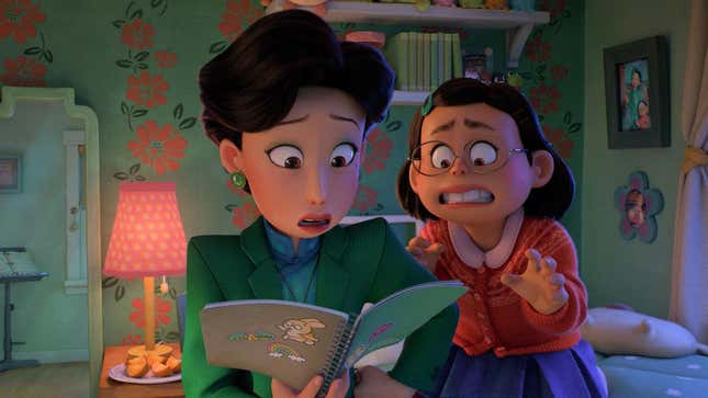 In a scene from the animated film Turning Red, a mom looks at a notebook with surprise while her young daughter grimaces in horror.