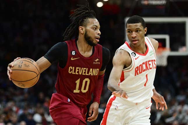 Mar 26, 2023; Cleveland, Ohio, USA; Cleveland Cavaliers guard Darius Garland (10) drives to the basket against Houston Rockets forward Jabari Smith Jr. (1) during the second half at Rocket Mortgage FieldHouse.