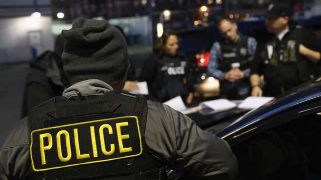 U.S. Immigration and Customs Enforcement (ICE) officers prepare for immigration raids in April 2018 in New York City.