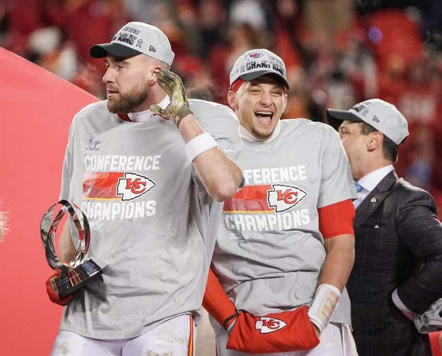 Jan 29, 2023; Kansas City, Missouri, USA; Kansas City Chiefs quarterback Patrick Mahomes (15) and tight end Travis Kelce (87) celebrate after winning the AFC Championship game against the Cincinnati Bengals at GEHA Field at Arrowhead Stadium.