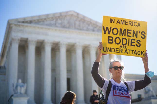 Pro-choice demonstrators are seen outside of the US Supreme Court in Washington, DC on November 1, 2021. The Supreme Court is set to hear challenges to Texas' restrictive abortion laws. - The conservative-majority US Supreme Court hears challenges on Monday to the most restrictive law passed since abortion was made a constitutional right nearly 50 years ago -- a Texas bill that bans a woman from terminating a pregnancy after six weeks. (Photo by MANDEL NGAN / AFP) (Photo by MANDEL NGAN/AFP via Getty Images)