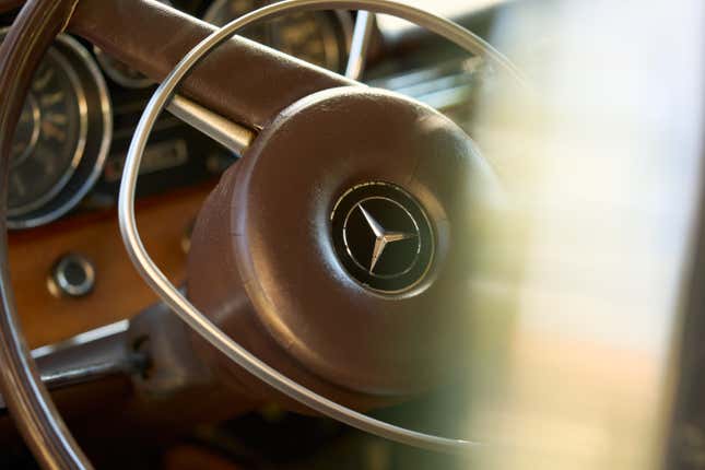 A brown classic Mercedes steering wheel