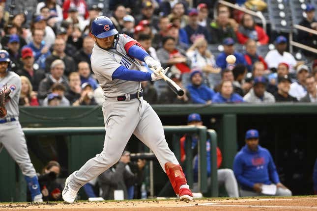 May 1, 2023; Washington, District of Columbia, USA; Chicago Cubs right fielder Seiya Suzuki (27) hits an RBI single against the Washington Nationals during the first inning at Nationals Park.