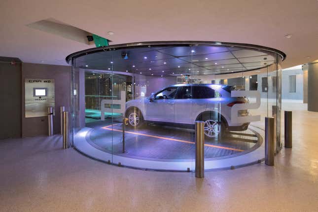 The Porsche Design Tower’s interiors are crafted so that cars can be transported and viewed in lobbies and living rooms.