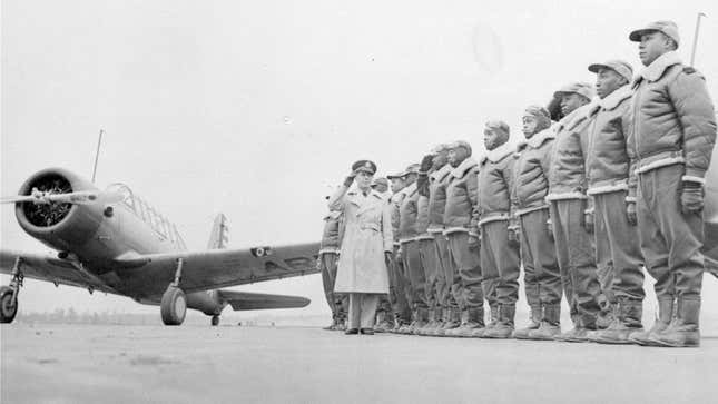 
Major James A. Ellison, left, returns the salute of Mac Ross of Dayton, Ohio, as he inspects the cadets at the Basic and Advanced Flying School for Black United States Army Air Corps cadets at the Tuskegee Institute in Tuskegee, Ala., in Jan. 23, 1942. For Veterans Day, a group of Democratic lawmakers is reviving an effort to pay the families of Black servicemen who fought on behalf of the nation during World War II for benefits they were denied or prevented from taking full advantage of when they returned home from war. 

