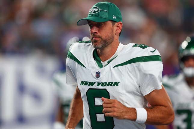 Aug 26, 2023; East Rutherford, New Jersey, USA; New York Jets quarterback Aaron Rodgers (8) leaves the field after the first half of their game against the New York Giants at MetLife Stadium.
