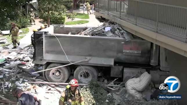 Image for article titled Two Injured, One Killed As Dump Truck Plows Into An Apartment Building