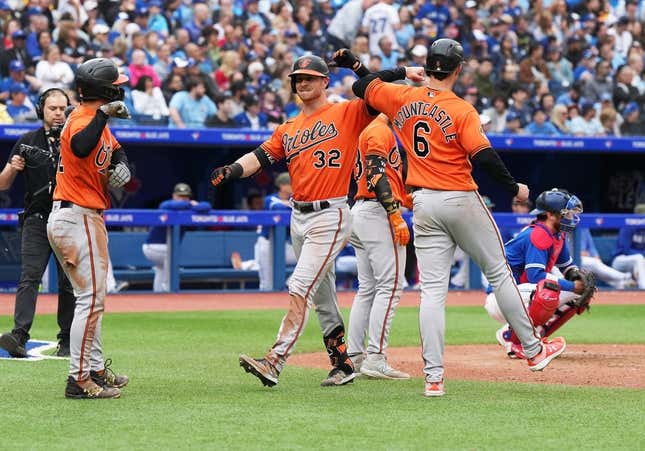 May 20, 2023; Toronto, Ontario, CAN; Baltimore Orioles designated hitter Ryan O&#39;Hearn (32) celebrates after hitting a three-run home run with first baseman Ryan Mountcastle (6) against the Toronto Blue Jays during the eighth inning at Rogers Centre.