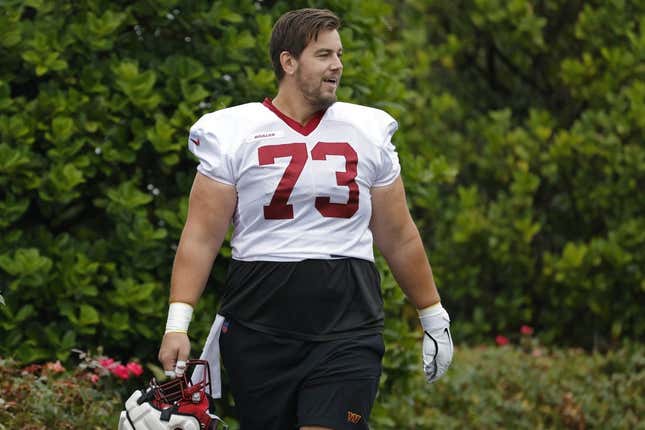 Jul 29, 2022; Ashburn, VA, USA; Washington Commanders center Chase Roullier (73) walks to the field during day three of training camp at the Park in Ashburn.