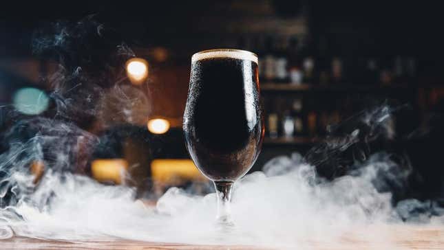 Smoke beer aka rauchbier on bar with smoke surrounding it