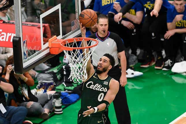 Apr 15, 2023; Boston, Massachusetts, USA; Boston Celtics forward Jayson Tatum (0) shoots a layup against the Atlanta Hawks during the first quarter of game one of the 2023 NBA playoffs at TD Garden.