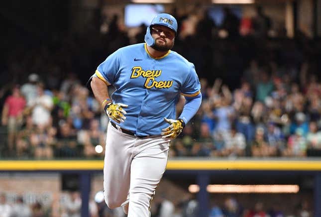 Aug 25, 2023; Milwaukee, Wisconsin, USA; Milwaukee Brewers first baseman Rowdy Tellez (11) rounds the bases after hitting a home run agains the San Diego Padres in the third inning at American Family Field.