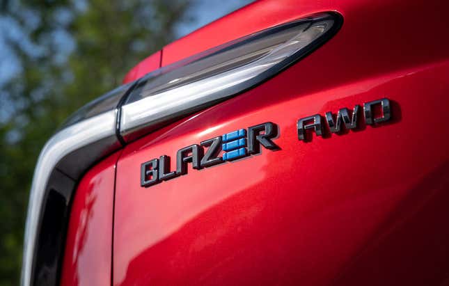 Close-up of rear badge of a red Chevrolet Blazer EV.