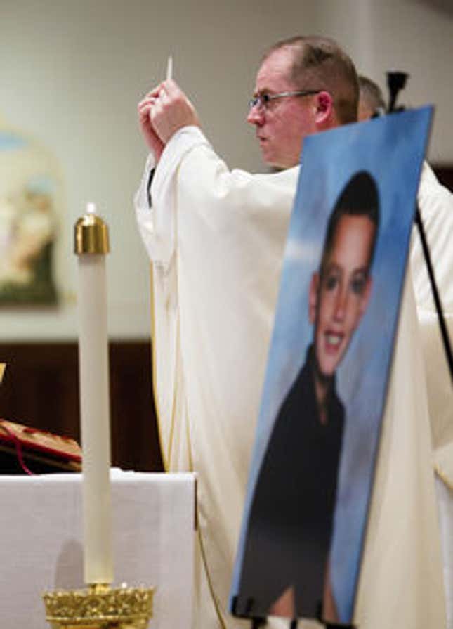Fr. Sean Connor conducts a mass to celebrate the life of Martin Richard, of Dorchester, one of the victims of the April 15 bombing at the Boston Marathon.