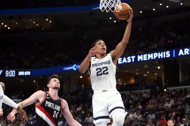 Apr 4, 2023; Memphis, Tennessee, USA; Memphis Grizzlies guard Desmond Bane (22) drives to the basket during the second half against the Portland Trail Blazers at FedExForum.