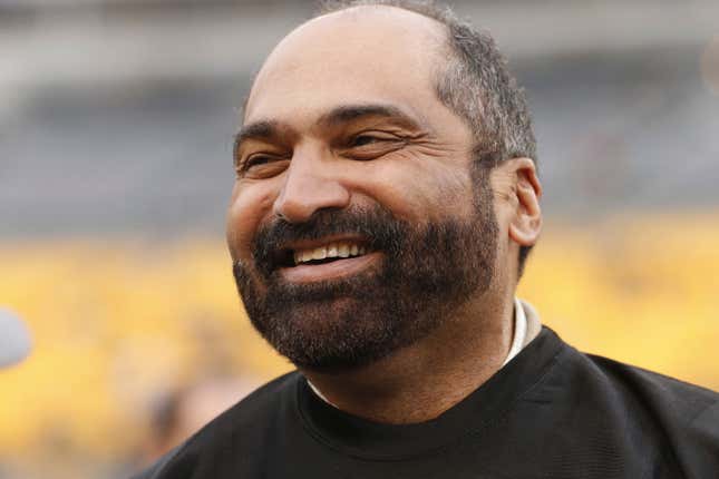 Former Pittsburgh Steelers pro football hall of fame running back Franco Harris takes part in festivities celebrating the 40th anniversary of the 1974 Steelers before an NFL football game between the Pittsburgh Steelers and the New Orleans Saints in Pittsburgh, Sunday, Nov. 30, 2014. Franco Harris, the Hall of Fame running back whose heads-up thinking authored “The Immaculate Reception,” considered the most iconic play in NFL history, died Wednesday, Dec. 21, 2022. He was 72.