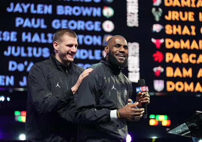 Feb 19, 2023; Salt Lake City, UT, USA; Team LeBron forward LeBron James (right) drafts center Nikola Jokic (15) before the 2023 NBA All-Star Game at Vivint Arena.