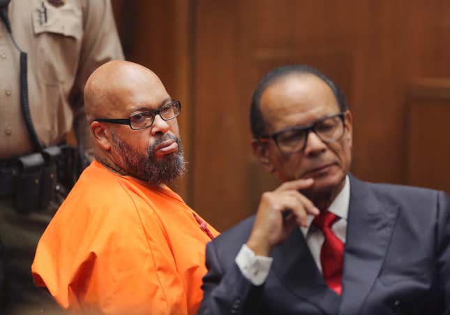 Marion “Suge” Knight, left, and his defense attorney Albert DeBlanc Jr. appear in court in Los Angeles, Thursday, Oct. 4, 2018. A judge sentenced him to 28 years in prison for the 2015 death of man he ran over outside a Compton burger stand.