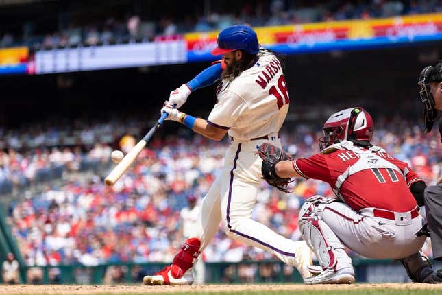 May 24, 2023; Philadelphia, Pennsylvania, USA; Philadelphia Phillies center fielder Brandon Marsh (16) hits a single during the fifth inning against the Arizona Diamondbacks at Citizens Bank Park.