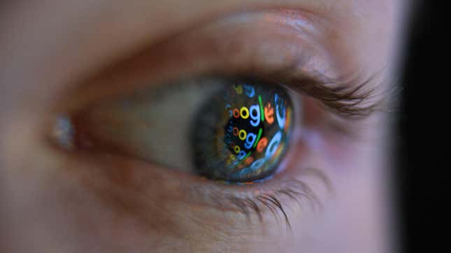 The Google logo reflected on a person's eye. 